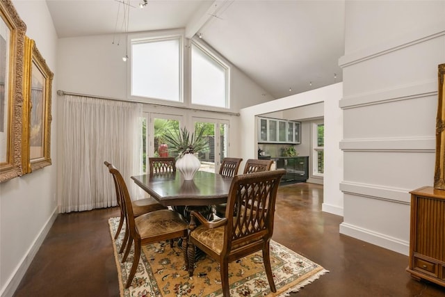 4305 Cliffwood Cir, Austin, TX 78759 - dining room featuring high vaulted ceiling and concrete floors