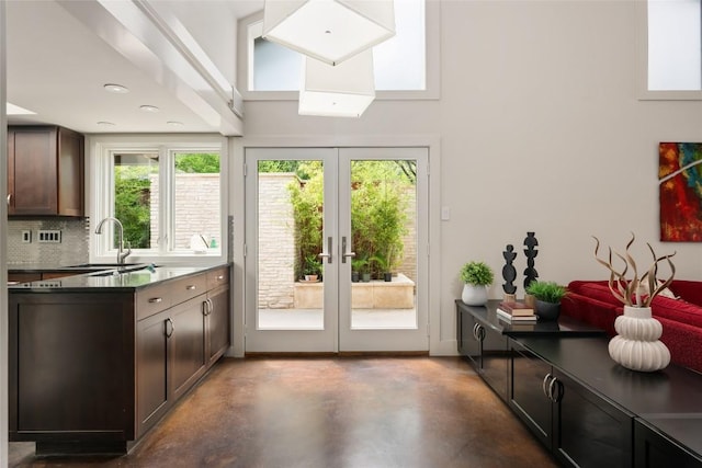 4305 Cliffwood Cir, Austin, TX 78759 - doorway to outside with finished concrete flooring and french doors