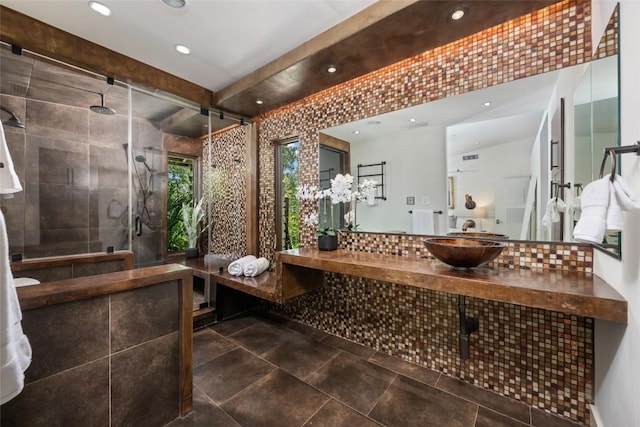 4305 Cliffwood Cir, Austin, TX 78759 - full bath with a shower stall, backsplash, vanity, tile patterned flooring, and recessed lighting