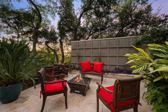 4305 Cliffwood Cir, Austin, TX 78759 - patio terrace at dusk featuring a patio area and an outdoor fire pit