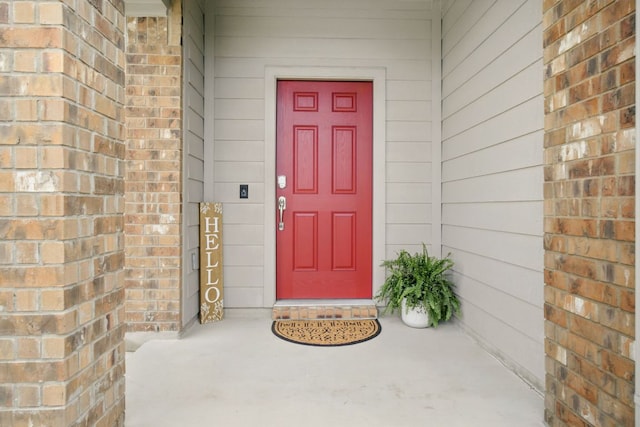 601 Sassafras St, Hutto, TX 78634 - property entrance with brick siding