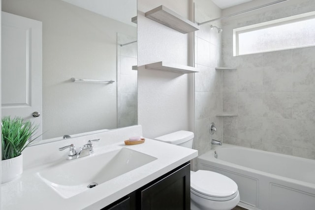 601 Sassafras St, Hutto, TX 78634 - bathroom featuring toilet, vanity, and washtub / shower combination
