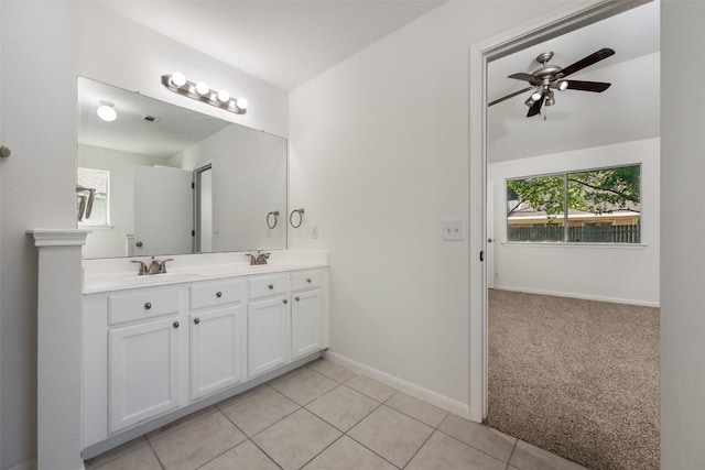 223 Keystone Loop, Kyle, TX 78640 - full bathroom with double vanity, a ceiling fan, and tile patterned flooring