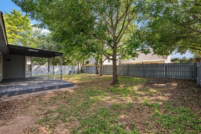223 Keystone Loop, Kyle, TX 78640 - fenced backyard featuring a wooden deck