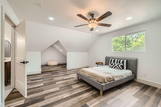 3610 Quiette Dr, Austin, TX 78754 - bedroom with wood finished floors, recessed lighting, vaulted ceiling, baseboards, and a ceiling fan