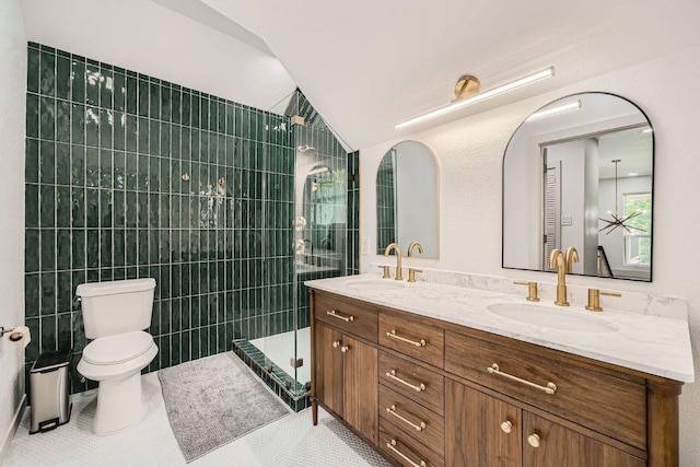 3610 Quiette Dr, Austin, TX 78754 - full bathroom featuring double vanity, toilet, a tile shower, lofted ceiling, and tile patterned flooring