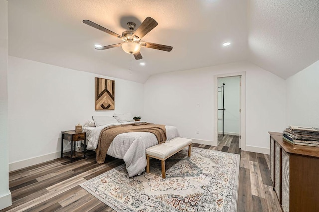3610 Quiette Dr, Austin, TX 78754 - bedroom featuring vaulted ceiling, baseboards, wood finished floors, a textured ceiling, and a ceiling fan