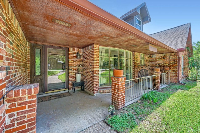 3610 Quiette Dr, Austin, TX 78754 - view of exterior entry with brick siding, roof with shingles, and covered porch