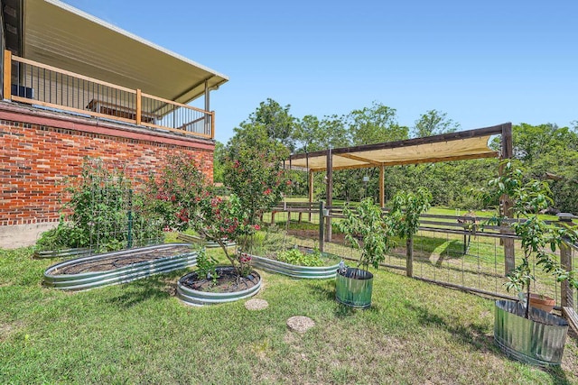 3610 Quiette Dr, Austin, TX 78754 - view of yard featuring a vegetable garden and a balcony