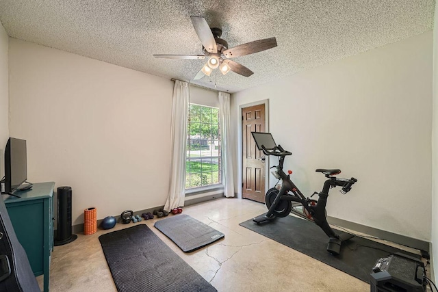 3610 Quiette Dr, Austin, TX 78754 - workout room featuring a ceiling fan and a textured ceiling