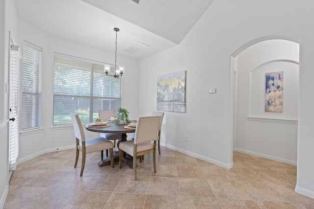 16413 Broadbay Dr, Austin, TX 78717 - dining space featuring a chandelier, baseboards, and light stone finish floors