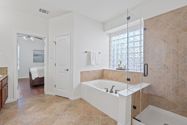 16413 Broadbay Dr, Austin, TX 78717 - ensuite bathroom with a garden tub, vanity, and a shower stall