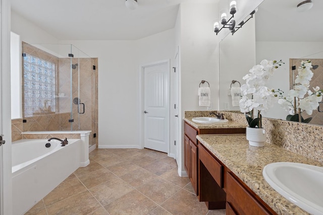 16413 Broadbay Dr, Austin, TX 78717 - bathroom featuring vanity, a stall shower, a bath, and baseboards