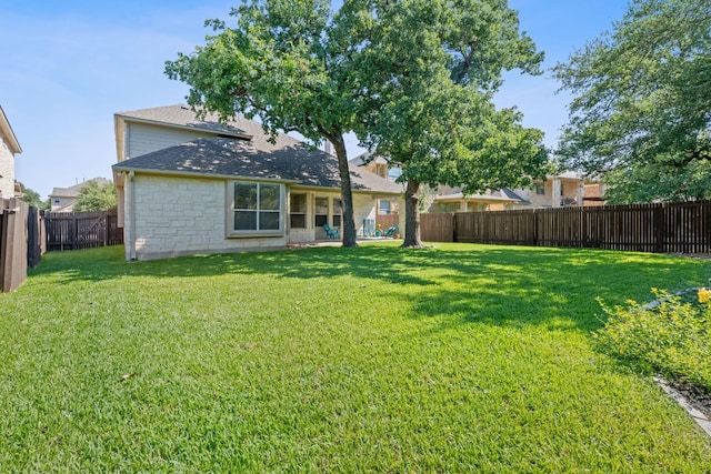 16413 Broadbay Dr, Austin, TX 78717 - back of house featuring stone siding and a shingled roof
