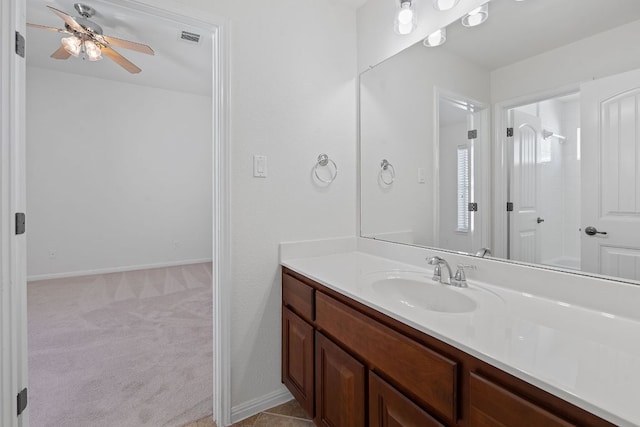 16413 Broadbay Dr, Austin, TX 78717 - bathroom featuring vanity, ceiling fan, and baseboards