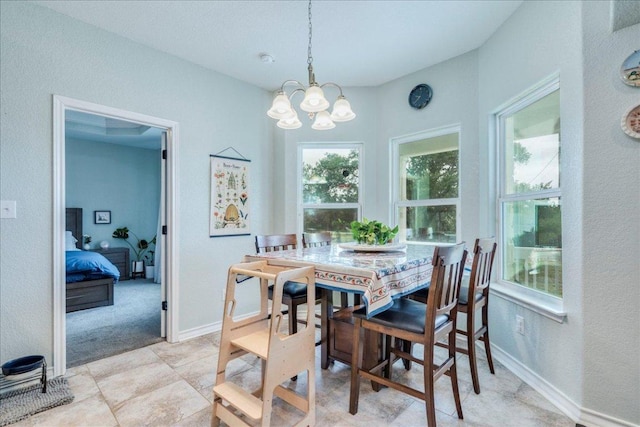 1033 Castleway Rd, New Braunfels, TX 78132 - dining space with a chandelier and a textured wall