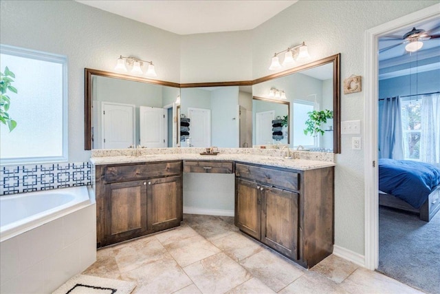 1033 Castleway Rd, New Braunfels, TX 78132 - full bath with connected bathroom, double vanity, and a garden tub