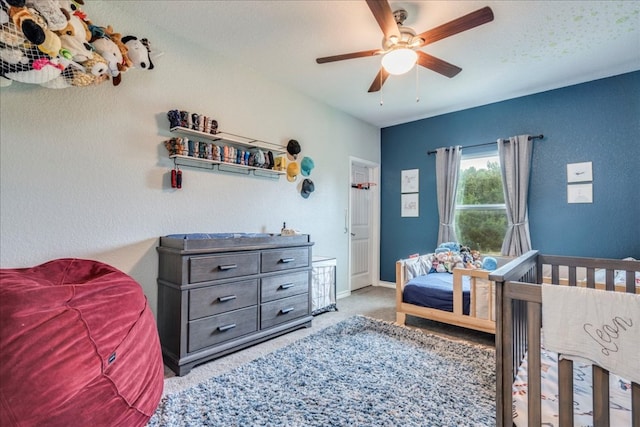 1033 Castleway Rd, New Braunfels, TX 78132 - bedroom with carpet floors and a ceiling fan