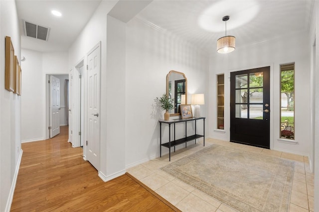 11817 Lake Stone Dr, Austin, TX 78738 - foyer entrance with wood finished floors and baseboards