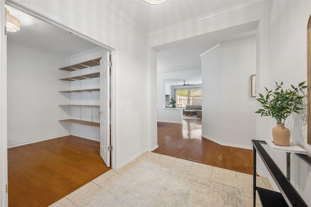 11817 Lake Stone Dr, Austin, TX 78738 - hallway featuring tile patterned flooring, ornamental molding, and baseboards
