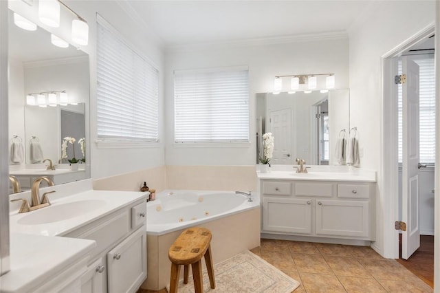 11817 Lake Stone Dr, Austin, TX 78738 - bathroom with plenty of natural light, two vanities, tile patterned flooring, a tub with jets, and crown molding