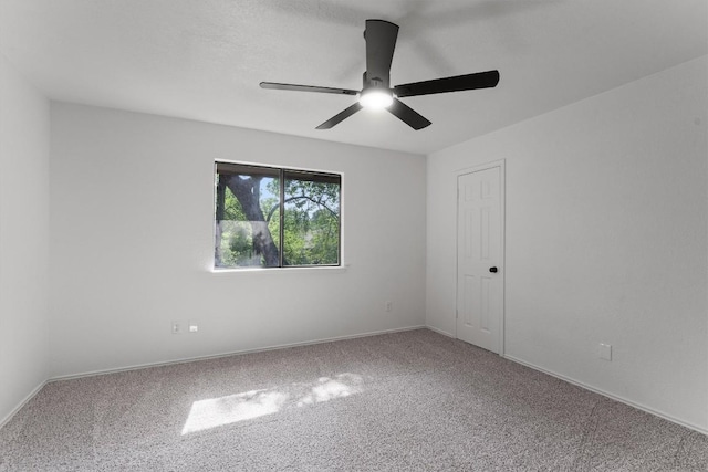 7915 Petaca Trl, Austin, TX 78729 - spare room featuring ceiling fan, carpet flooring, and baseboards