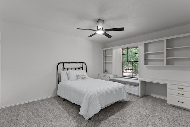 7915 Petaca Trl, Austin, TX 78729 - bedroom with light colored carpet and a ceiling fan