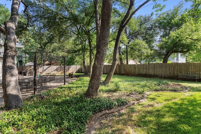 7915 Petaca Trl, Austin, TX 78729 - view of yard with a patio area