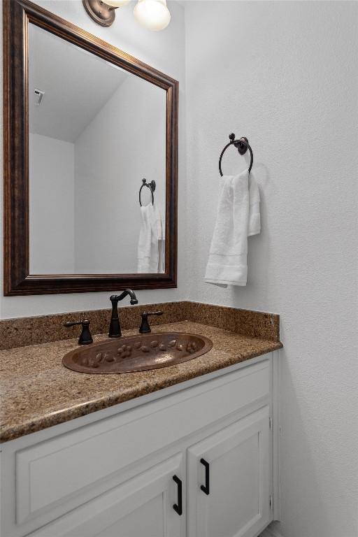 7915 Petaca Trl, Austin, TX 78729 - bathroom with vanity