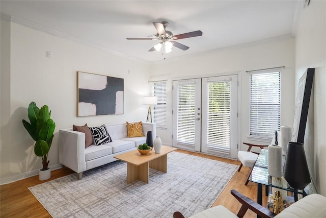 2502 Leon St Unit 208, Austin, TX 78705 - living room with ceiling fan, wood finished floors, french doors, crown molding, and baseboards