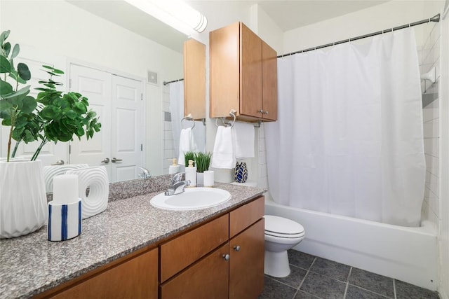 2502 Leon St Unit 208, Austin, TX 78705 - full bathroom with vanity, shower / tub combo with curtain, toilet, and tile patterned floors