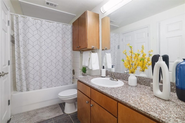 2502 Leon St Unit 208, Austin, TX 78705 - bathroom with vanity, shower / tub combo, toilet, and tile patterned flooring