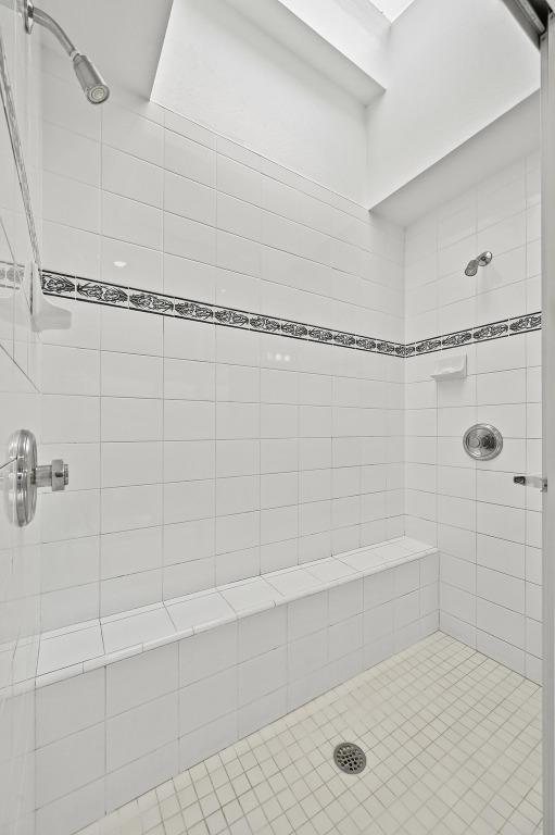 717 Mariner, Lakeway, TX 78734 - full bathroom featuring a tile shower