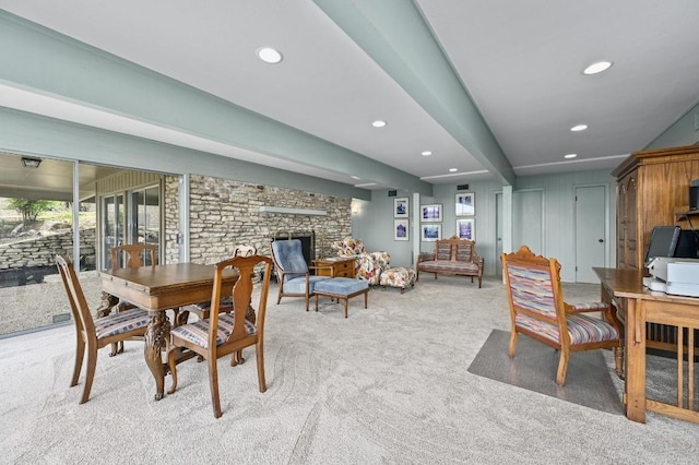 717 Mariner, Lakeway, TX 78734 - dining area featuring light carpet, recessed lighting, and a fireplace