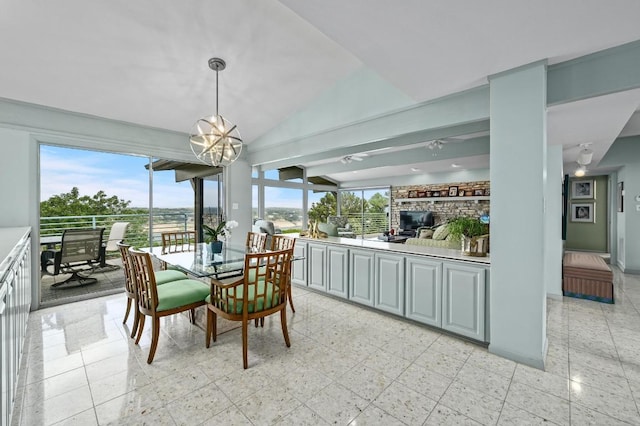 717 Mariner, Lakeway, TX 78734 - dining space with a chandelier and lofted ceiling