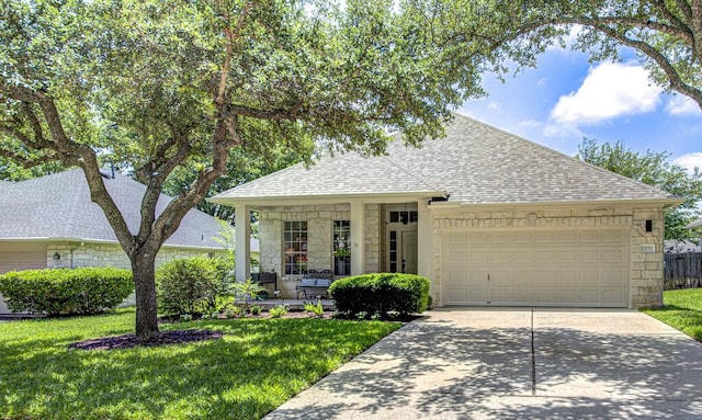 15053 Haley Holw, Austin, TX 78728 - view of front of property featuring a shingled roof, stone siding, a front lawn, and driveway