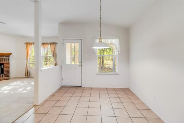 201 Murchison Dr, Cedar Creek, TX 78612 - entryway with a fireplace and lofted ceiling