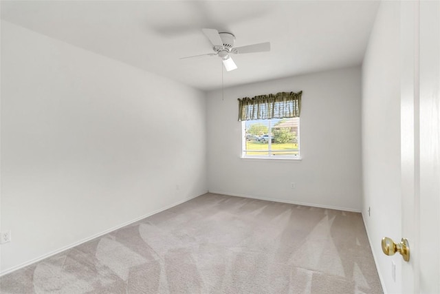 201 Murchison Dr, Cedar Creek, TX 78612 - empty room featuring light carpet, ceiling fan, and baseboards