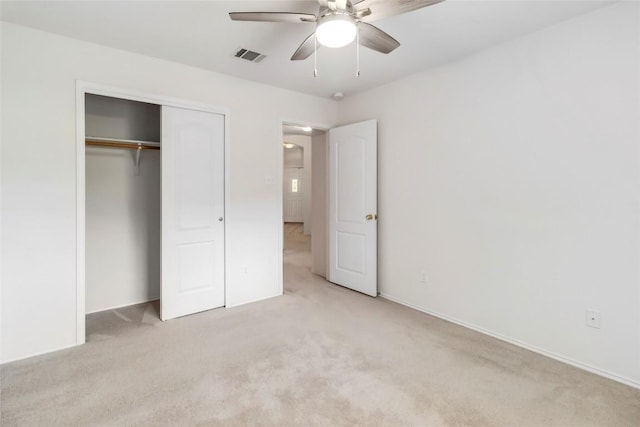 201 Murchison Dr, Cedar Creek, TX 78612 - unfurnished bedroom featuring light carpet, a closet, ceiling fan, and baseboards