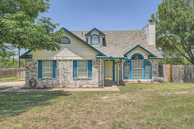 14214 Dewberry Dr, Pflugerville, TX 78660 - view of front of house with a chimney