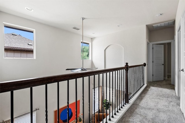 7709 Menchaca Rd Unit 14, Austin, TX 78745 - corridor with carpet flooring and recessed lighting