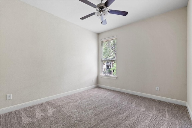 7709 Menchaca Rd Unit 14, Austin, TX 78745 - carpeted empty room featuring baseboards and a ceiling fan