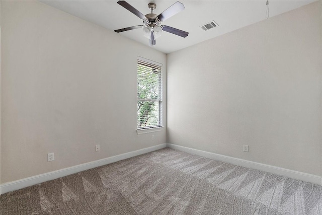 7709 Menchaca Rd Unit 14, Austin, TX 78745 - carpeted empty room with baseboards and ceiling fan