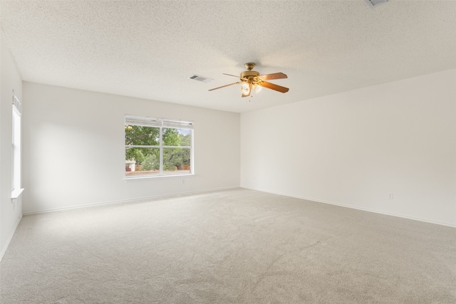 2105 Zeppelin Dr, Cedar Park, TX 78613 - unfurnished room with carpet flooring, a ceiling fan, and a textured ceiling