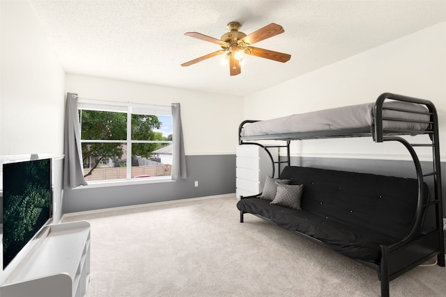 2105 Zeppelin Dr, Cedar Park, TX 78613 - bedroom featuring carpet, a ceiling fan, and a textured ceiling