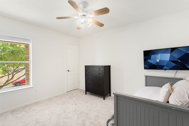 2105 Zeppelin Dr, Cedar Park, TX 78613 - bedroom featuring light carpet, a ceiling fan, and baseboards