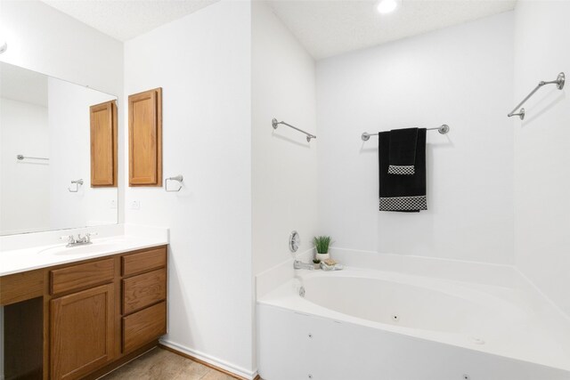 2105 Zeppelin Dr, Cedar Park, TX 78613 - full bathroom featuring vanity, a jetted tub, and wood finished floors