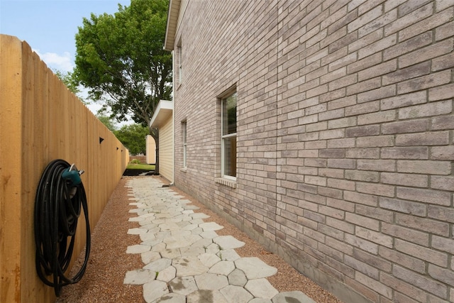 2105 Zeppelin Dr, Cedar Park, TX 78613 - view of side of home with brick siding
