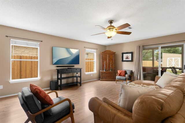 2105 Zeppelin Dr, Cedar Park, TX 78613 - living room featuring plenty of natural light, ceiling fan, and wood finished floors