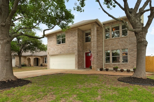2105 Zeppelin Dr, Cedar Park, TX 78613 - traditional-style home featuring a garage, concrete driveway, and brick siding